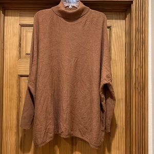 JOSEPH A.  Oversized turtleneck sweater.